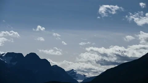 Time lapse of a panoramic view of a vast glacier covered mountain  Stock Footage 144005537