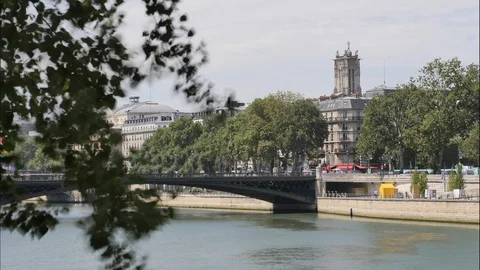 Time lapse in Paris. Saint-Jacques tower and the Seine river. Stock Footage 93294498