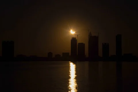 Time lapse of partial solar eclipse of the sun as viewed over Arabian gulf wi Stock Footage 122129577