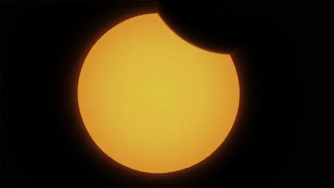 Time lapse of partial solar eclipse close up. The moon mostly covers sun Stock Footage 155685449