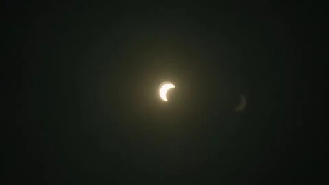 Time Lapse of Partial Solar Eclipse With Crescent Sun in the Netherlands Stock Footage 342347927