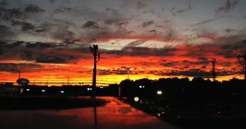 Time lapse of an Partly Cloudy Orange Sunset 스톡 동영상 41925462