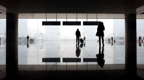 Time Lapse: Passengers and their shadows at railway station Stock Footage 35364361