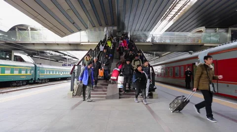Time Lapse of passengers arrive for their train at Beijing Railway Station Stock Footage 47216533