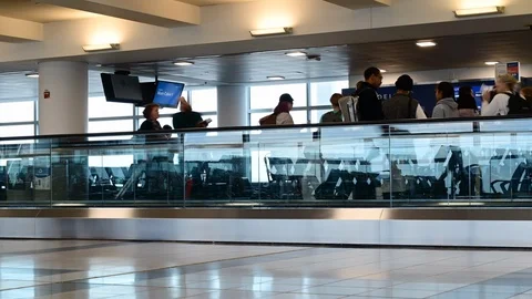 Time lapse of passengers boarding the gate at airport terminal Stock Footage 126119242