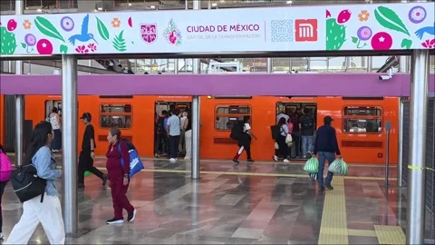 Time lapse of passengers boarding orange train at Observatorio metro station Stock Footage 337189790