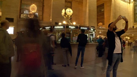 Time lapse passengers on line at Grand Central Info booth and snapping pictures Stock Footage 129704635