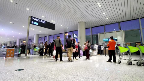 Time-lapse of passengers moving at queue to board the plane Stock Footage 320118309