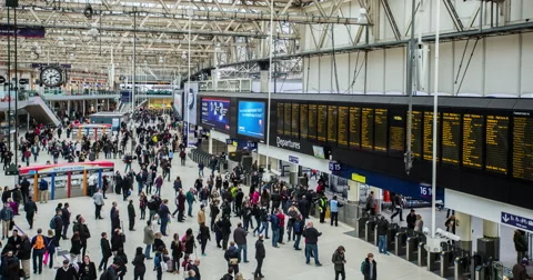 Time lapse of passengers passing through London Waterloo train station Stock Footage 54995503