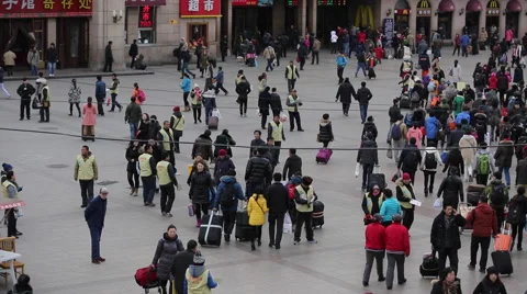 Time Lapse of passengers walking at the square of Beijing Railway Station Stock Footage 47216540