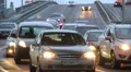 Time lapse passing cars city bridge junction, dusk lights on HD Footage