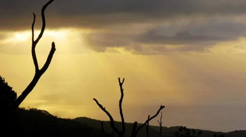 Time lapse of passing clouds and sun rays Stock Footage 8520478