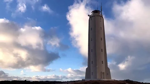 Time lapse of passing clouds left to right of Malarrif lighthouse ,Snaefellsnes, 스톡 동영상 318244142