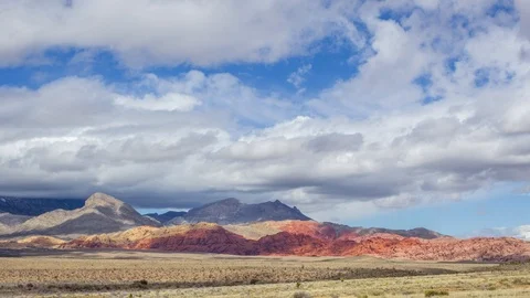 Time Lapse of Passing Clouds Over Red Rock Canyon Stock Footage 107947067