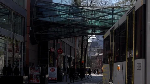 Time lapse of people and trams Manchester city centre UK England 4K Stock Footage 106987503