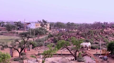 Time lapse of people circulating around the tip of the holy hill of Govardhan Stock Footage 51109028