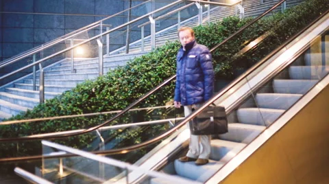 Time lapse of people coming down the stairs exiting from work Stock-Footage 57214201