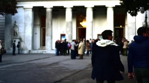 Time lapse: People coming out of the theater Stock Footage 74530265