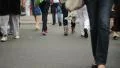 Time-lapse people crossing road after cars drive by, feet only HD Footage