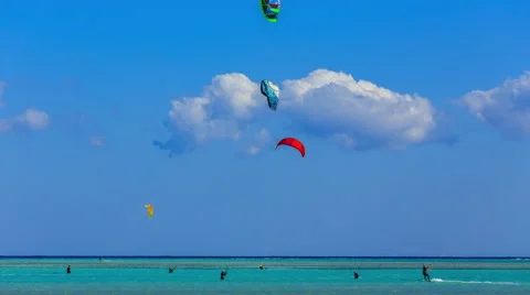 Time lapse People engaged in kite surfing near Hamata Marina at the Red Stock Footage 58290559