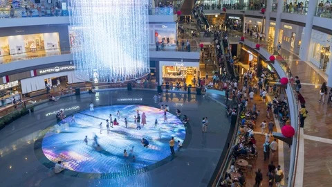 Time lapse of People inside the Marina Bay Sands Shoppes mall in Singapore Stock Footage 124894478