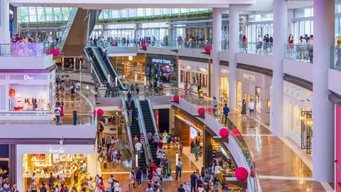Time lapse of People inside the Marina Bay Sands Shoppes mall in Singapore Stock Footage 124895042