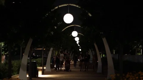 Time lapse people by modern architecture at night. Video stock 71127346