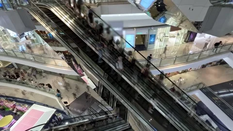 Time Lapse of People Traffic Moving on Retail Mall Escalators to Shopping Stores Stock Footage 334280316