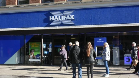 Time lapse people using Halifax bank in York United Kingdom Stock Footage 96703131