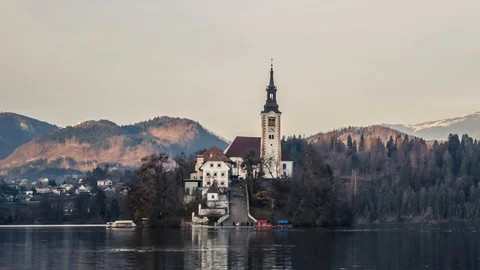 Time lapse people walking on famous church stairs on lake Bled island Stock Footage 120989612