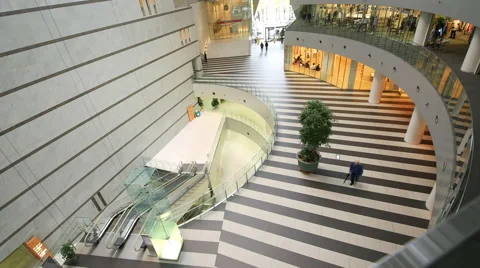 TIme-lapse of people walking inside of office lobby Stock Footage