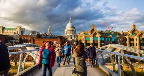 Time-lapse of people walking over Millennium Bridge towards St.Paul's Cathedral Stock Footage 93138097