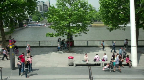 Time lapse of people walking by the Thames, Southbank. Stock Footage 38411661
