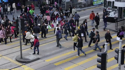 Time Lapse of people walking through a crossing in Hong Kong Stock Footage 45380502
