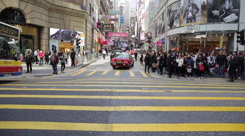 Time Lapse of people walking through a crossing in downtown Hong Kong Stock Footage 45408444