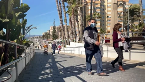 Time-lapse of people walking at the Torrox costa Stock Footage 168193078