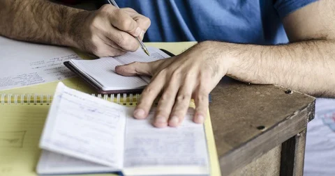 Time lapse of a person’s work writing information Stock-Footage 129575303