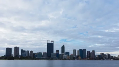Time lapse of a Perth's Skyline captured at sunrise, with clouds covering Stock Footage 113685428