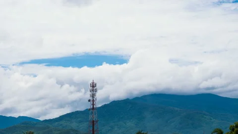 Time Lapse Phone Tower background is clouds, rain and mountains. Stock Footage 155052724