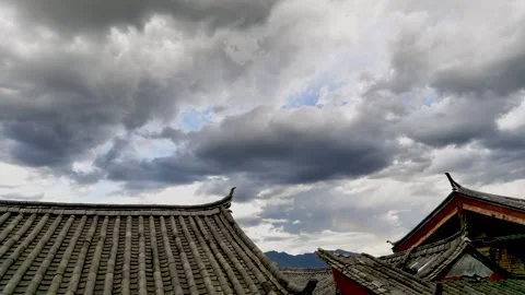 Time lapse Photography of Changing Clouds over Lijiang Ancient City in Yunnan Stock-Footage 336883435