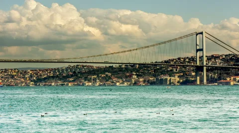 Time Lapse Photography clouds moving across the blue sky with Bosphorus Bridge Stock Footage 47583593