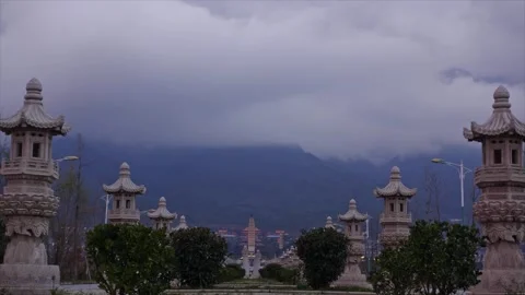 Time lapse Photography of Distant View of Three Pagodas and Yulong Snow Mountain Video stock 336883550