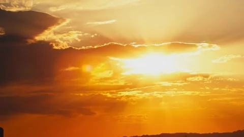 Time-lapse photography of the glow of the setting sun and the evening clouds Stock Footage 327191470