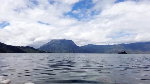 Time lapse Photography of Lake Surface Cloud Shadow in Lugu Lake Yunnan China Stock Footage 336898121