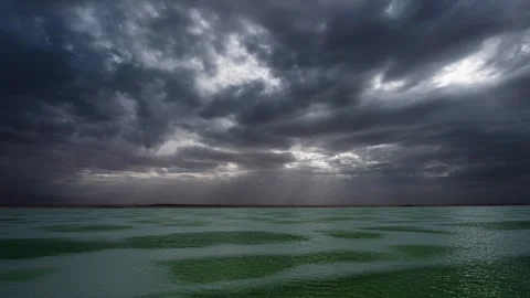 Time Lapse Photography of Lake Surface with Thick Clouds on Cloudy Day at 스톡 동영상 337150662