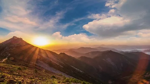 Time lapse photography of mountain ridge sunset glow layered canyon dusk flowing Stock Footage 337925863