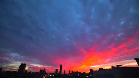 Time lapse photography of sky clouds and sunset clouds over cities Stock Footage 274123439