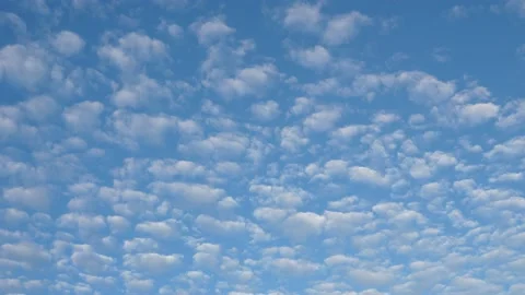 Time-lapse photography, white clouds floating in the blue sky Stock Footage 142248725