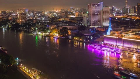 Time lapse of Phraya river in Bangkok at night with boats 動画素材 84949729