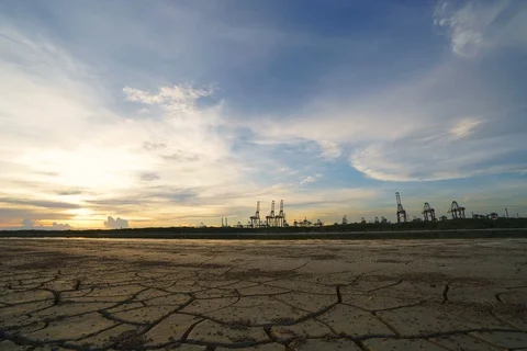 Time lapse pier operation with sunset smooth clound and foregound break groun Stock Footage 107611665